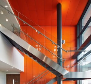 orange-armstrong-ceilings-help-the-sun-rise-on-a-regeneration-first