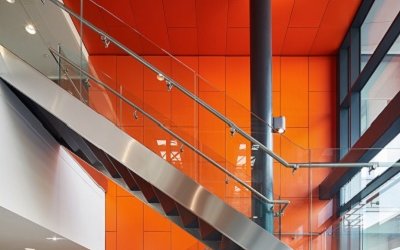 Orange Armstrong Ceilings help the sun rise on a regeneration first